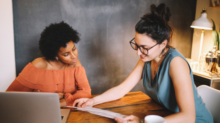 two women discussing new tax law changes and nonprofits